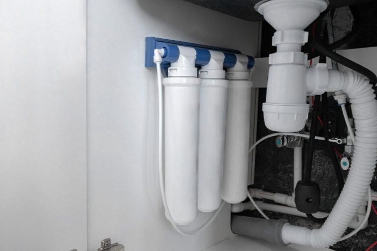 Water Quality in Spartanburg: Do You Need a Water Softener? water softener system installed in home